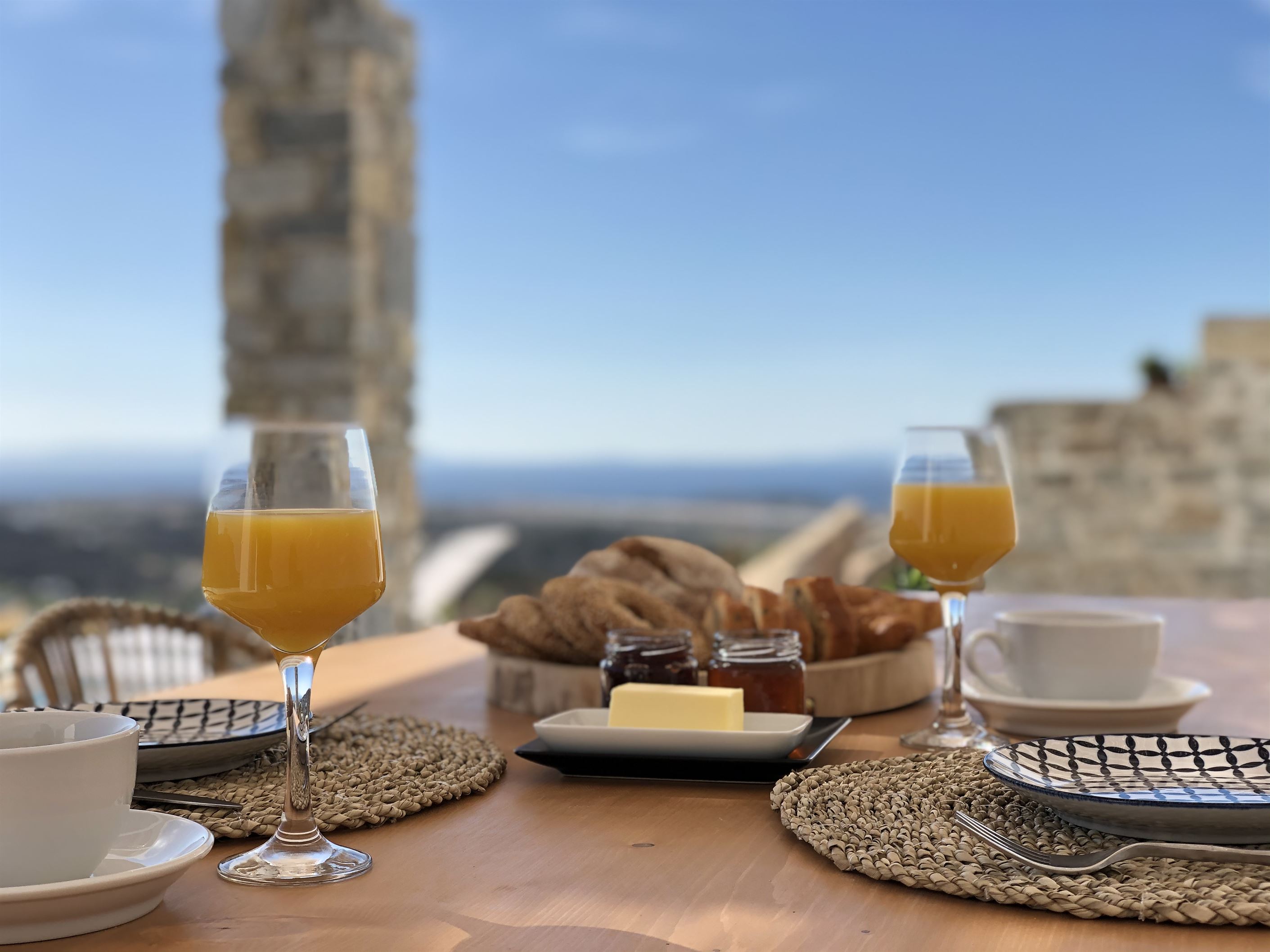 Breakfast on a private terrace overlooking the sea